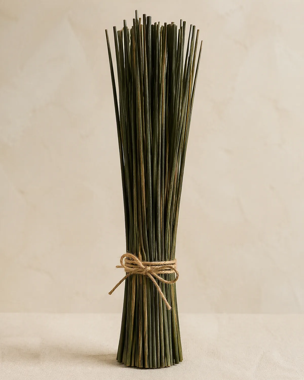 Illustrative image (placeholder): a tied bundle of dried coconut leaf midribs